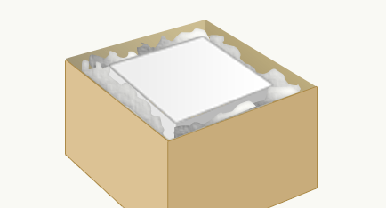 ダンボール箱に骨箱を詰める